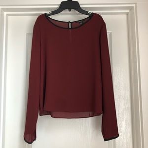 Maroon blouse.